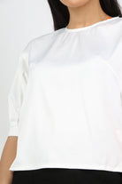 نتشي بلوزة سادة كلاسيك مفتوحة الظهر نص كم بف نسائي