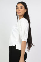 نتشي بلوزة سادة كلاسيك مفتوحة الظهر نص كم بف نسائي