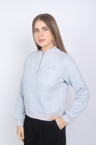 نتشي بلوزة بجيوب وسحاب كم طويل نسائي