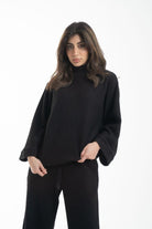 نتشي بلوزة نسائي برقبة كم طويل بياقة مرتفعة سادة