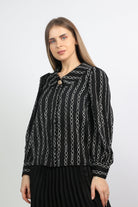 نتشي بلوزة منقوشة كم طويل