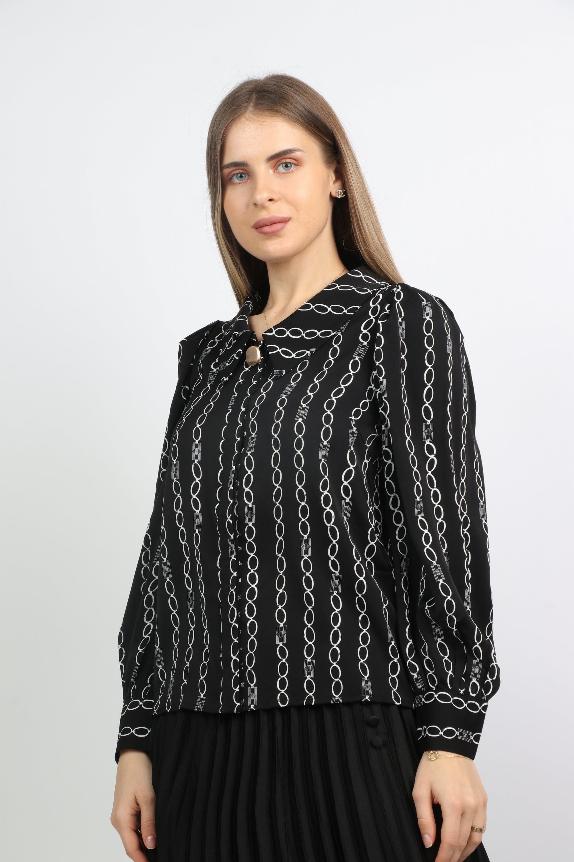 نتشي بلوزة منقوشة كم طويل