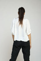 نتشي بلوزة سادة أوفر سايز كم قصير منفوخ نسائي