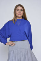 نتشي بلوزة أوفر سايز متداخلة كم طويل نسائي