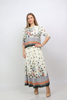 نتشي بلوزة مشجرة فتحة عنق دائرية 3/4 كم نسائي أوف وايت