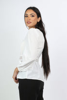 نتشي بلوزة كلاسيك مخصرة بتطريز على الجانبين كم طويل منفوخ نسائي