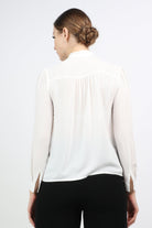 نتشي بلوزة بفيونكة سادة مع كم طويل نسائي