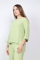 نتشي بلوزة سادة طويلة من الخلف قصيرة من الأمام بكم طويل نسائي