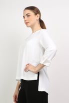 نتشي بلوزة سادة طويلة من الخلف قصيرة من الأمام بكم طويل نسائي