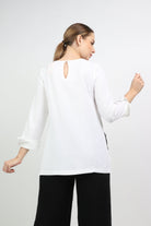 نتشي بلوزة سادة طويلة من الخلف قصيرة من الأمام بكم طويل نسائي