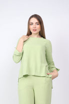 نتشي بلوزة سادة طويلة من الخلف قصيرة من الأمام بكم طويل نسائي