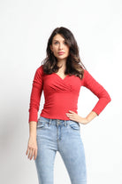 نتشي بلوزة سادة مخصرة بأكمام طويلة