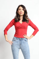 نتشي بلوزة سادة مخصرة بأكمام طويلة